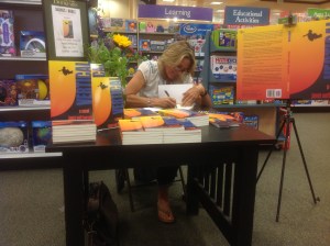 Janet signing Vertical at Barnes & Noble.